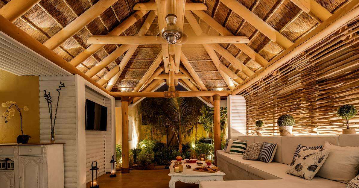 Cape Reed turnkey project private villa with thatched outdoor living area with timber cladding