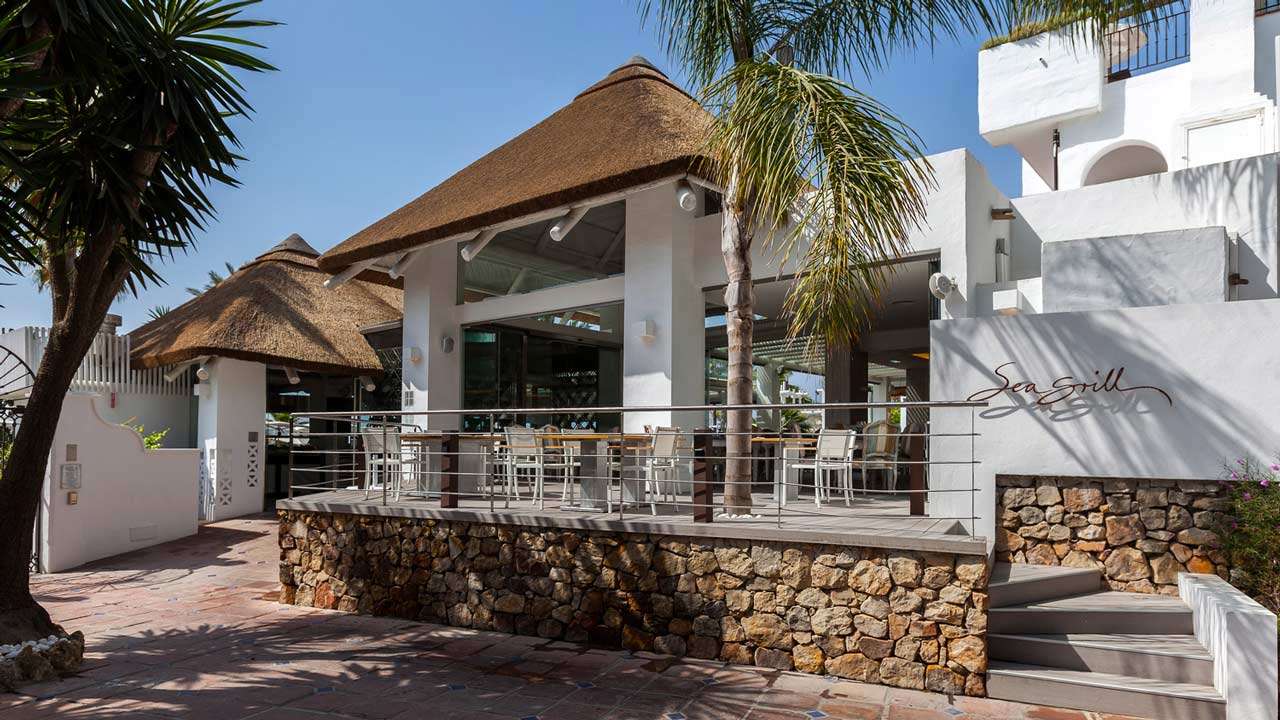 Sea Grill restaurant thatched roof at Puente Romano